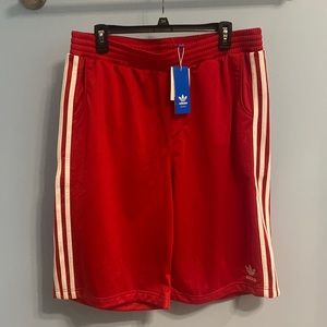 Adidas basketball shorts, size large fit more like an XL. Red. Pockets.